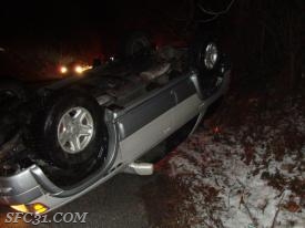 overturned icy bypass route vehicle plagued conditions area road